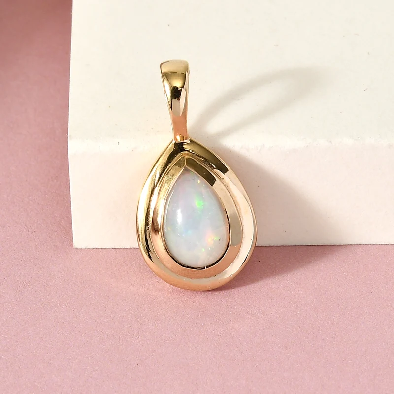 Natürlicher äthiopischer Welo Opal Anhänger, 925 Silber vergoldet, ca. 0.86 ct