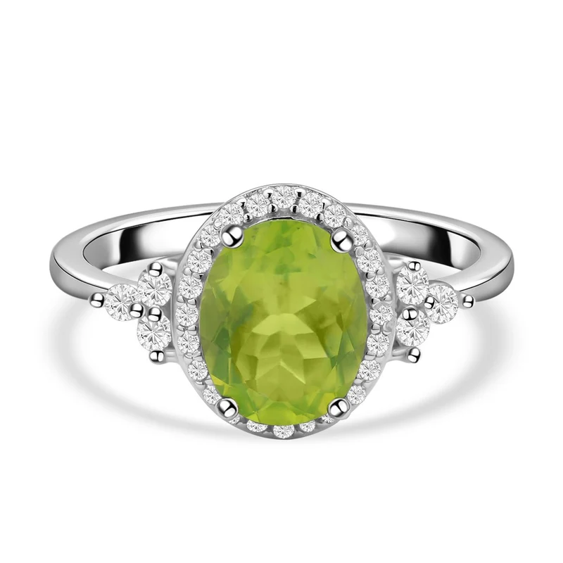 Natürlicher Peridot und weißer Zirkon Ring. 925 Silber rhodiniert ca. ca. 3.15 ct
